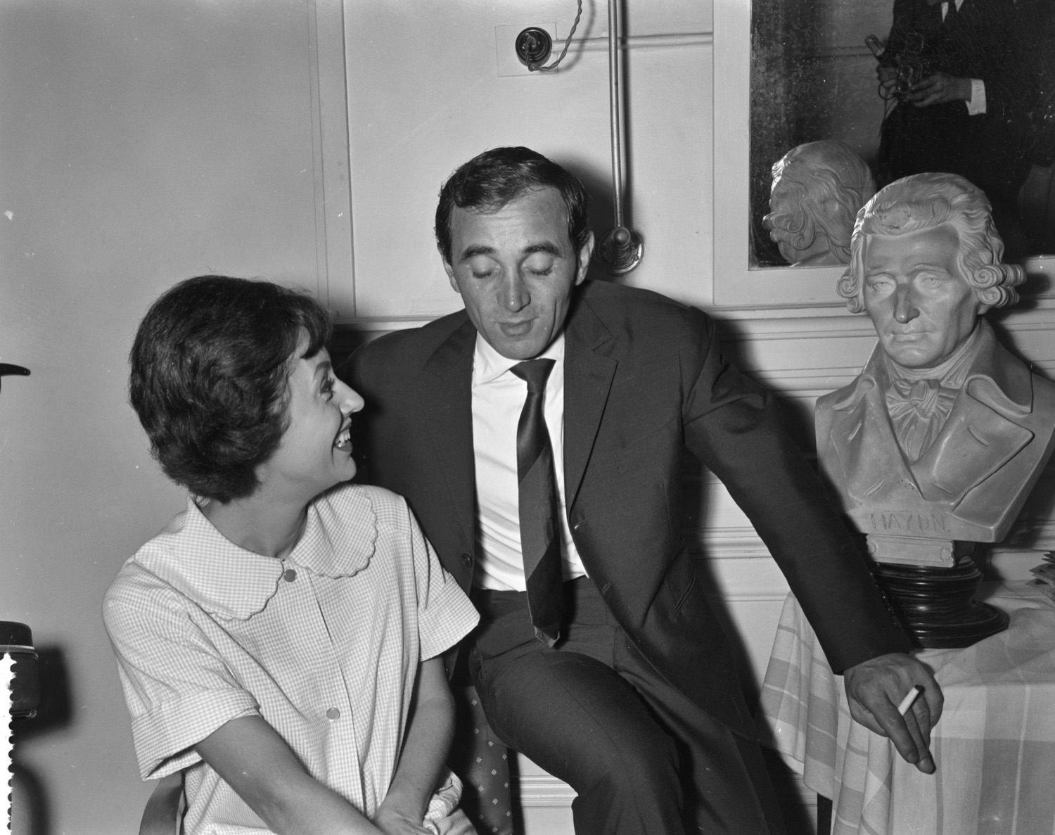 Aznavour with a cigarette in a private sitting room, 1961